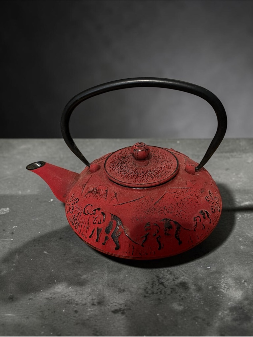 Teavana Red Cast Iron Teapot with Elephant Relief and Black Handle